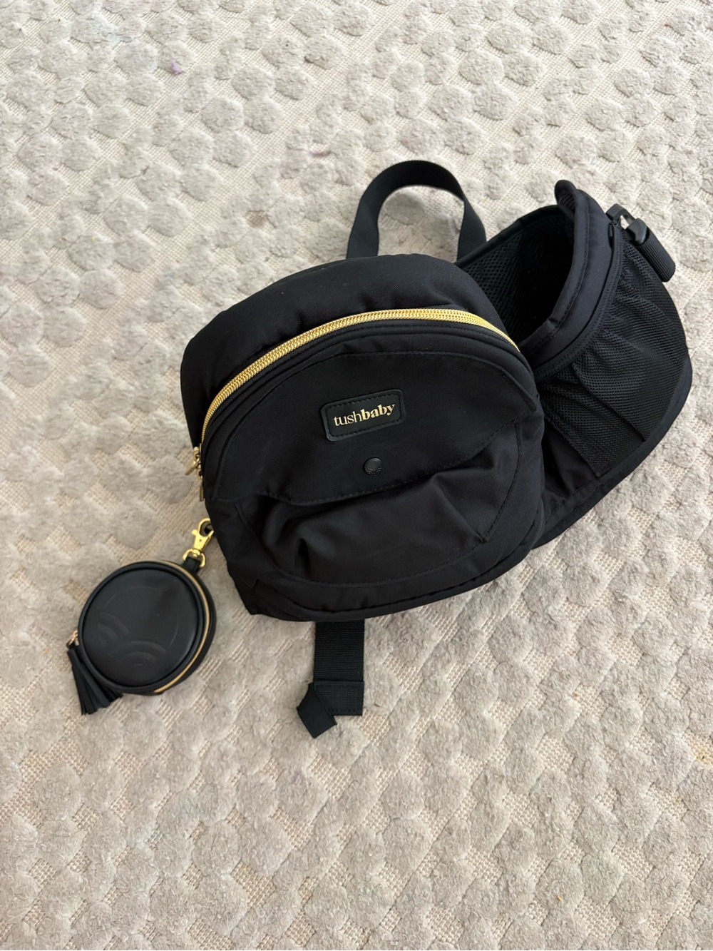 Tushbaby Black Crossbody Sling Bag with Gold Accents